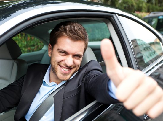 Car driver making ok sign